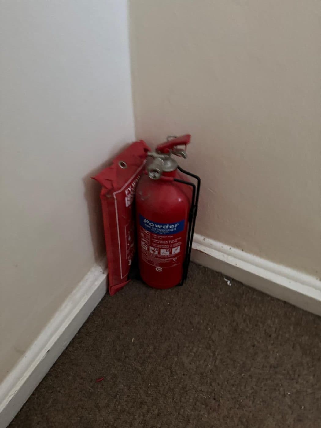 Fire extinguisher checked during the fire risk assessment